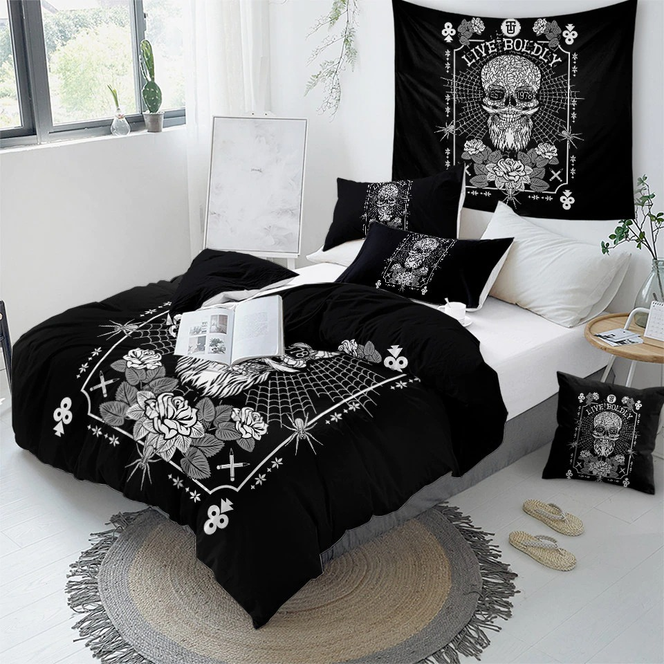 Gothic bedding set with skull and floral design, styled in a black room with decorative pillows and wall art.