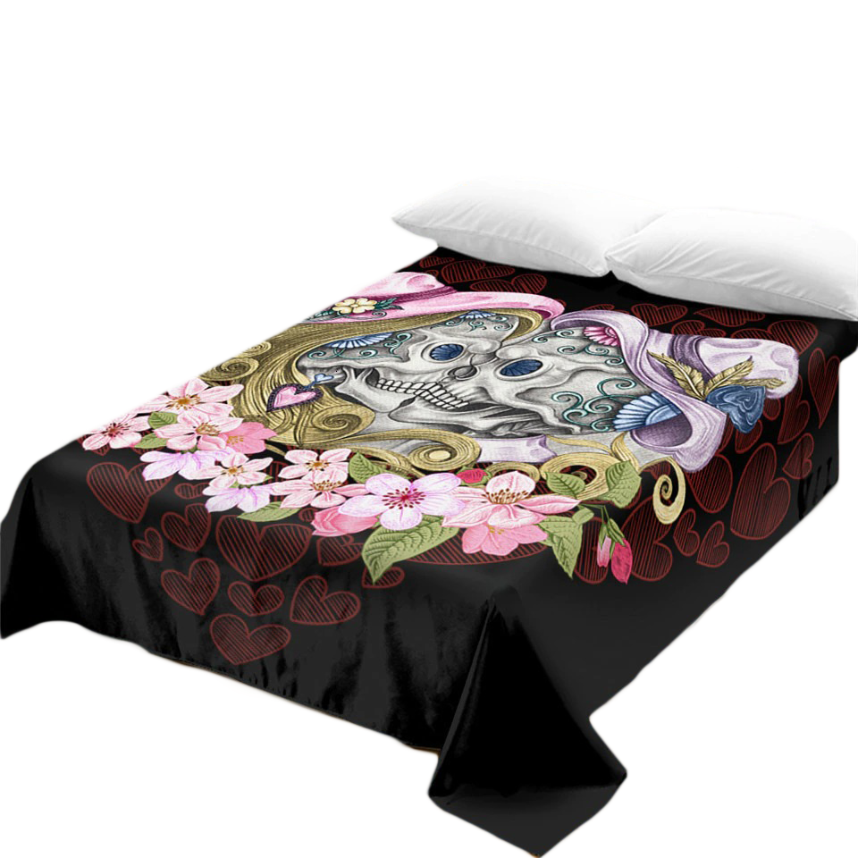 Gothic bedspread featuring a skull design with flowers and hearts, perfect for stylish home decor.