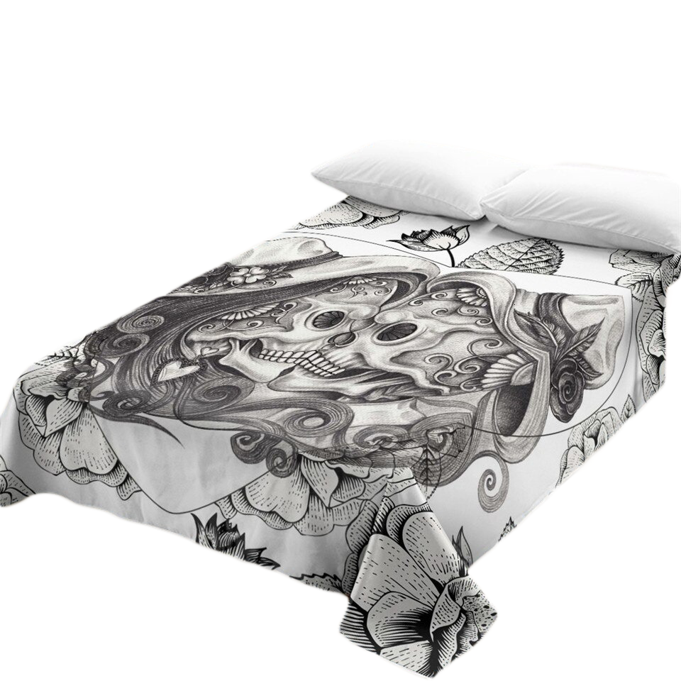 Gothic bedspread featuring skull and floral design, perfect for stylish bedding in vintage home decor.