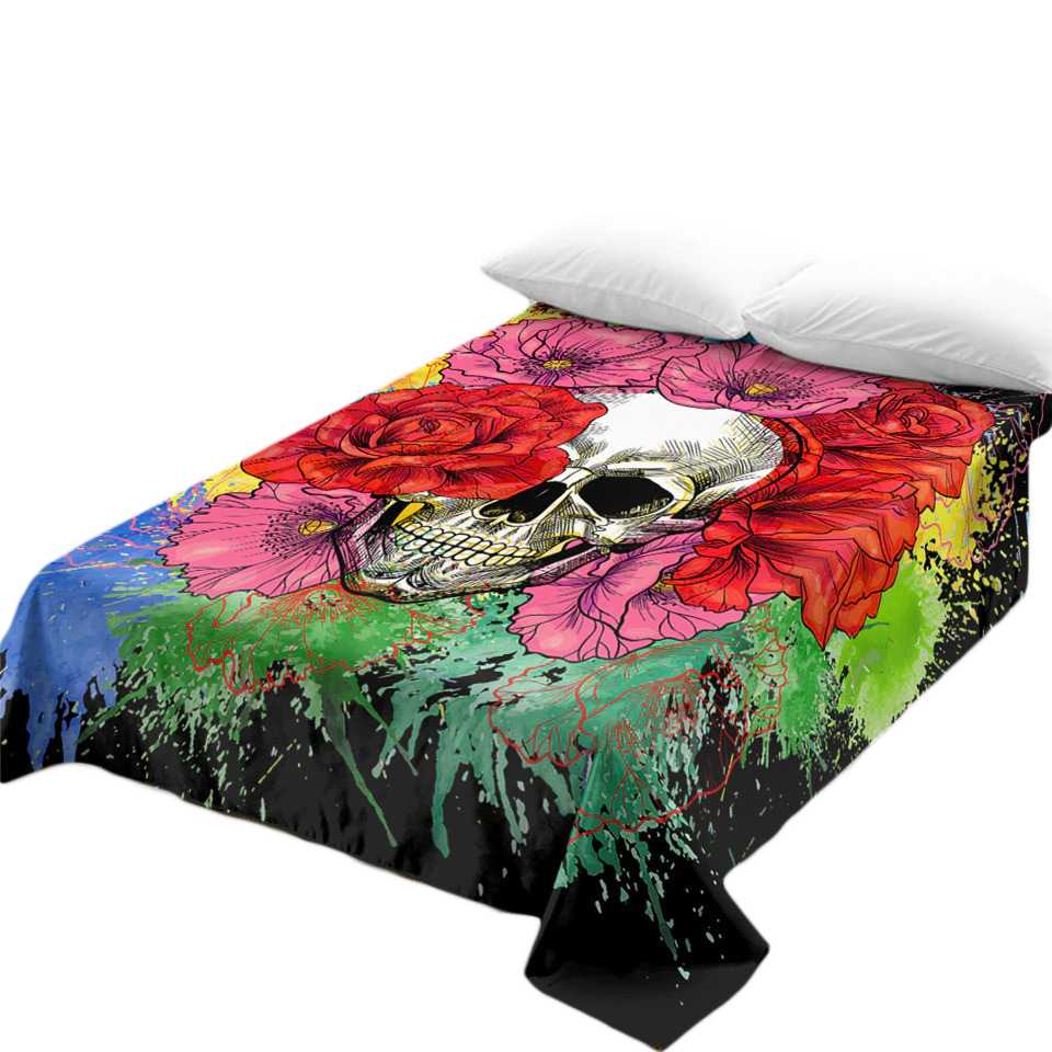 Gothic bedspread featuring a colorful skull design with vibrant flowers, perfect for stylish vintage bedding decor.