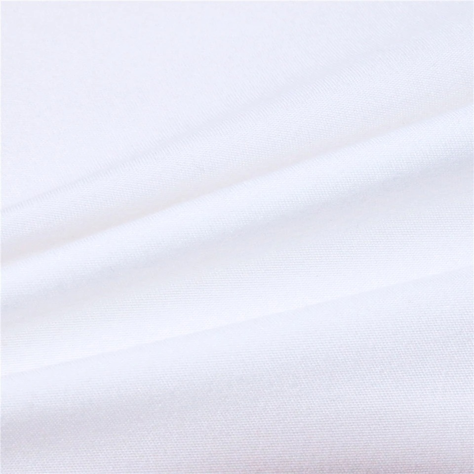 Close-up of soft white fabric, perfect for stylish bedding and home decor designs.