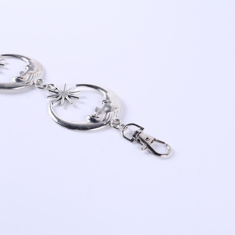 Gothic metallic belt chain featuring moons and a star for women, perfect for high waist styling.