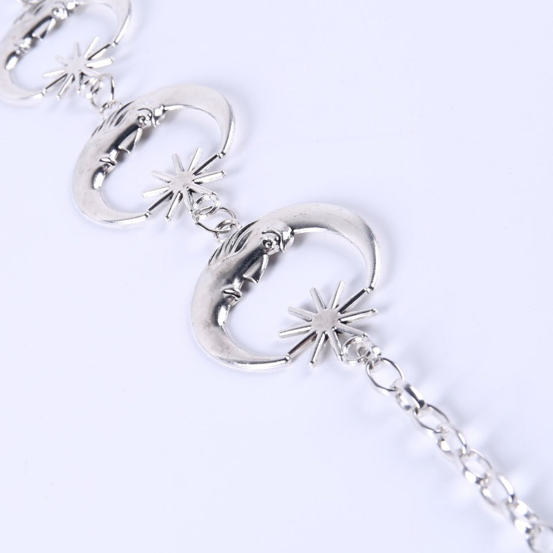 Gothic metallic high waist belt with moon and star design, perfect for adding a vintage touch to any outfit.