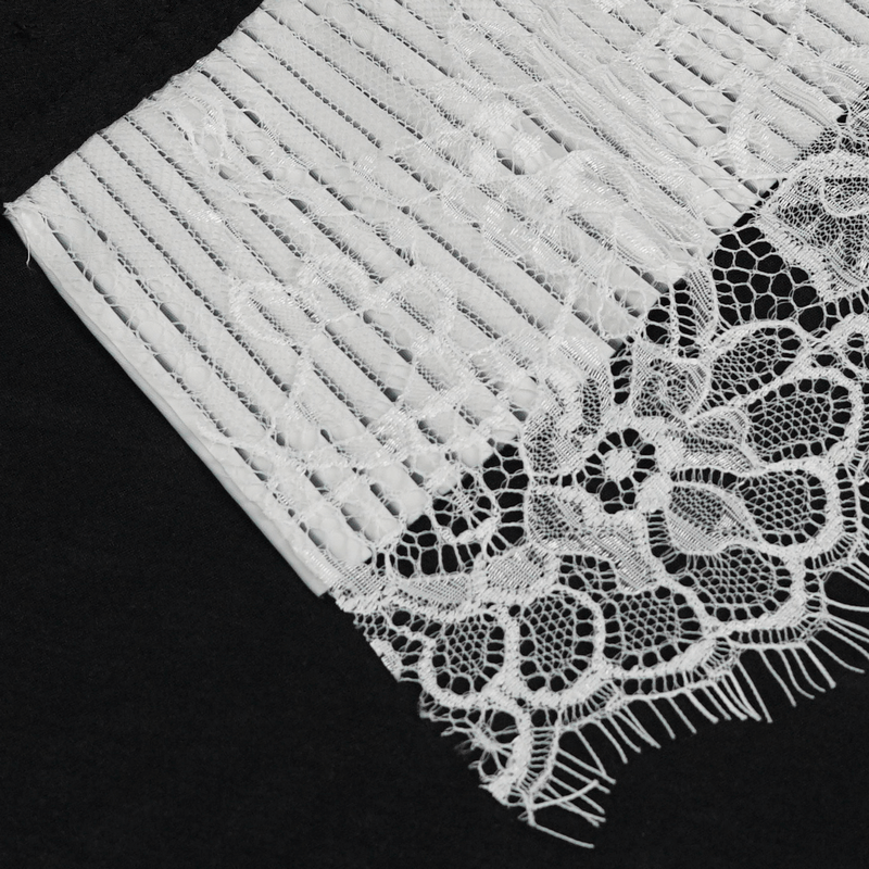 Close-up of elegant white lace fabric with pleated design, perfect for Gothic style fingerless gloves.