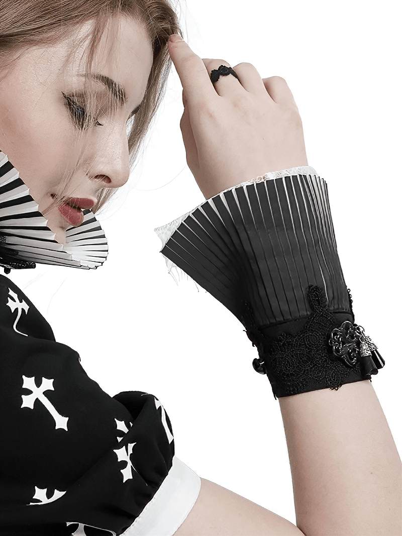 Elegant model wearing Gothic black and white pleated lace fingerless gloves, showcasing unique style and design.