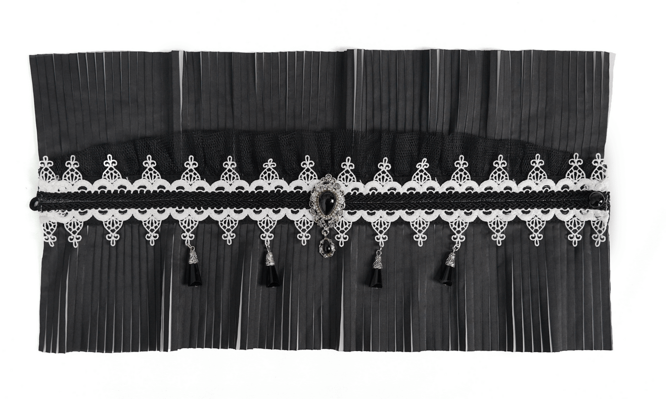 Gothic black and white pleated collar with lace, beading, and tassels for an elegant accessory.