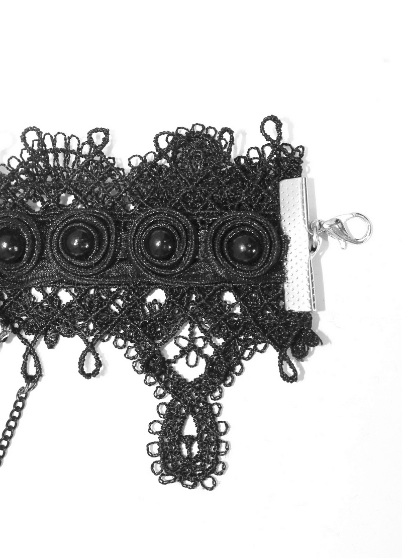Gothic black bracelet with finger cover and chains, stylish lace design perfect for gothic outfits.