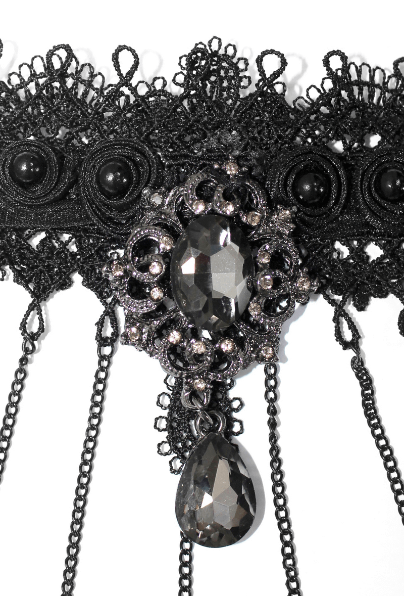 Gothic black lace bracelet with chains and jewel embellishment, perfect for stylish gothic outfits.