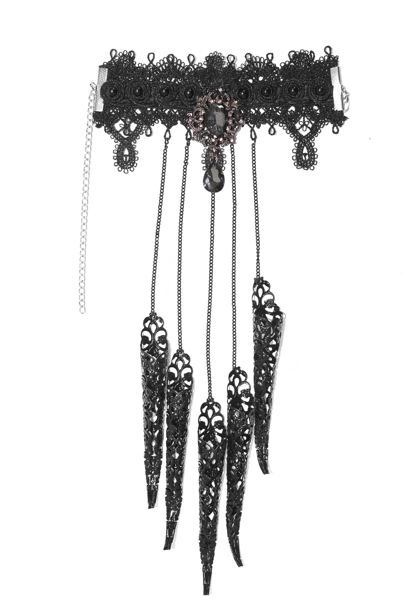 Gothic black bracelet with finger cover and chains, perfect accessory for a gothic outfit.