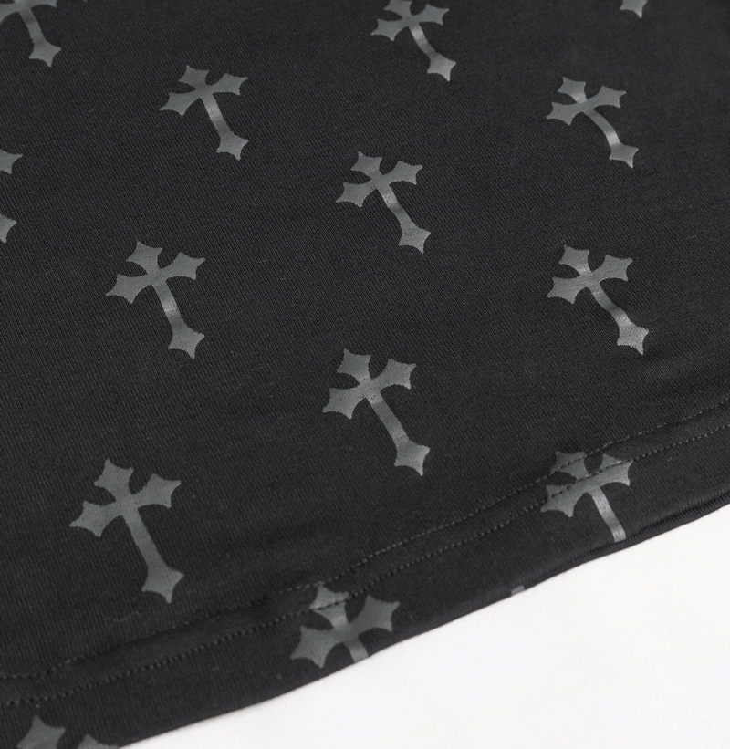Close-up of gothic black blouse fabric featuring a repeated black cross pattern, perfect for gothic fashion lovers.