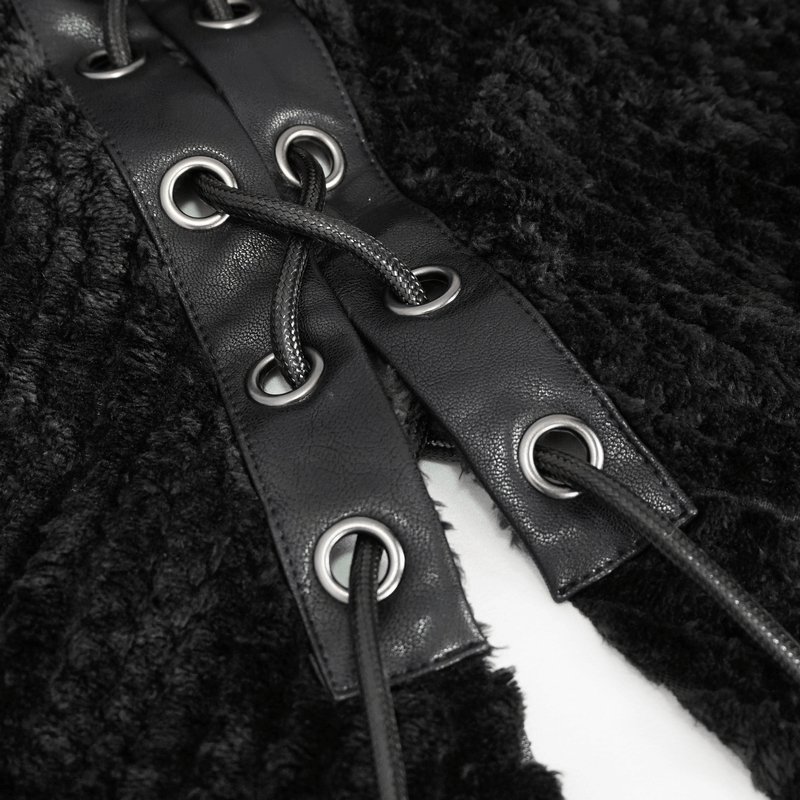 Close-up of lace-up detail on gothic black fleece hooded cape, showcasing fabric texture and design.