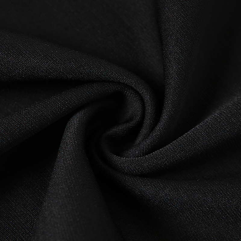 Close-up of black fabric showcasing the soft texture and drape ideal for gothic style skirts.
