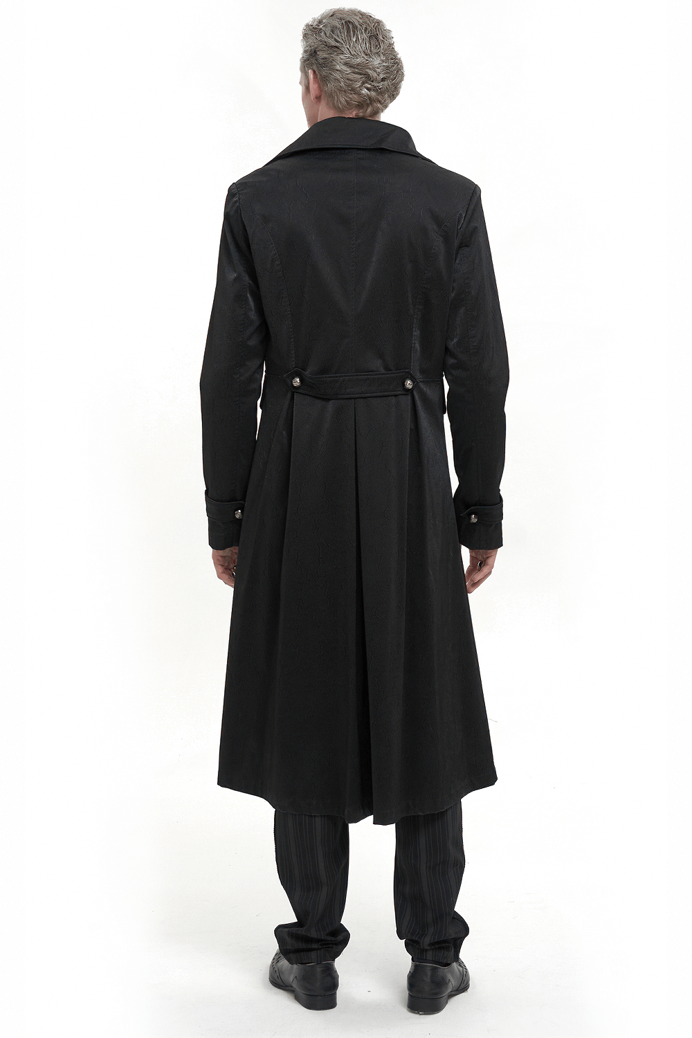 Back view of a man in a gothic black leather coat with pattern buttons, showcasing its stylish cut and long design.