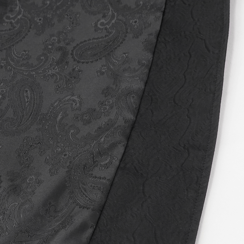 Close-up of intricate paisley pattern on black fabric, ideal for Gothic or punk style fashion.