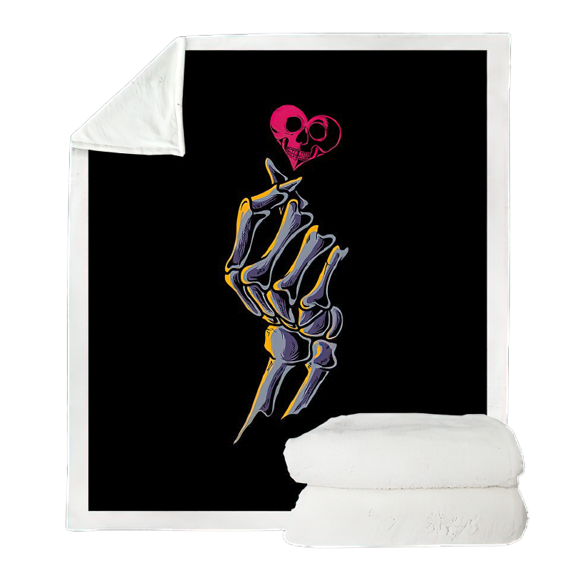 Gothic black plush blanket featuring a skeletal hand holding a pink heart, perfect for cozy home decor.