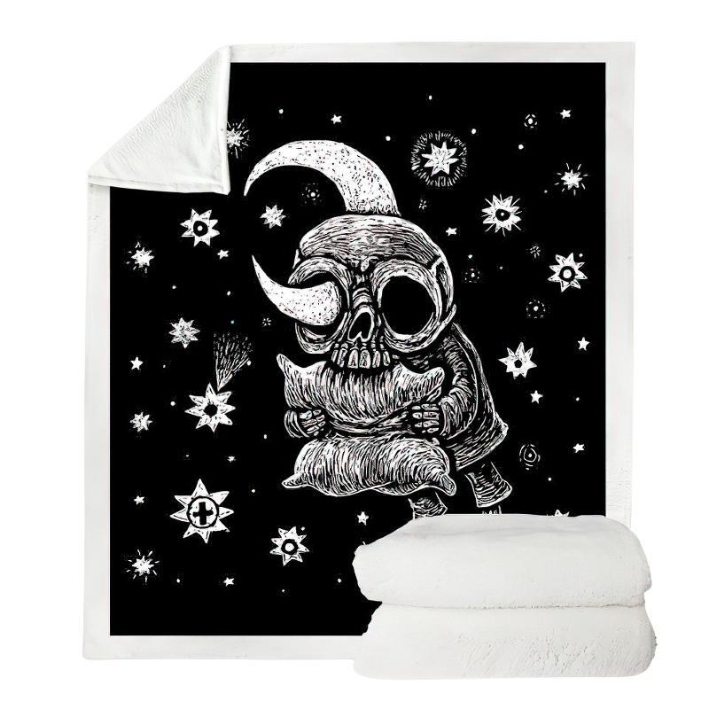 Gothic black plush blanket featuring a skull and moon design, perfect for cozy decor and warmth.