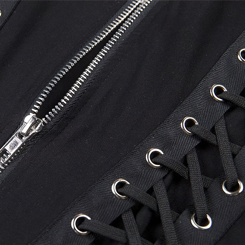 Close-up of a gothic black top showing silver zipper and stylish lace-up details.