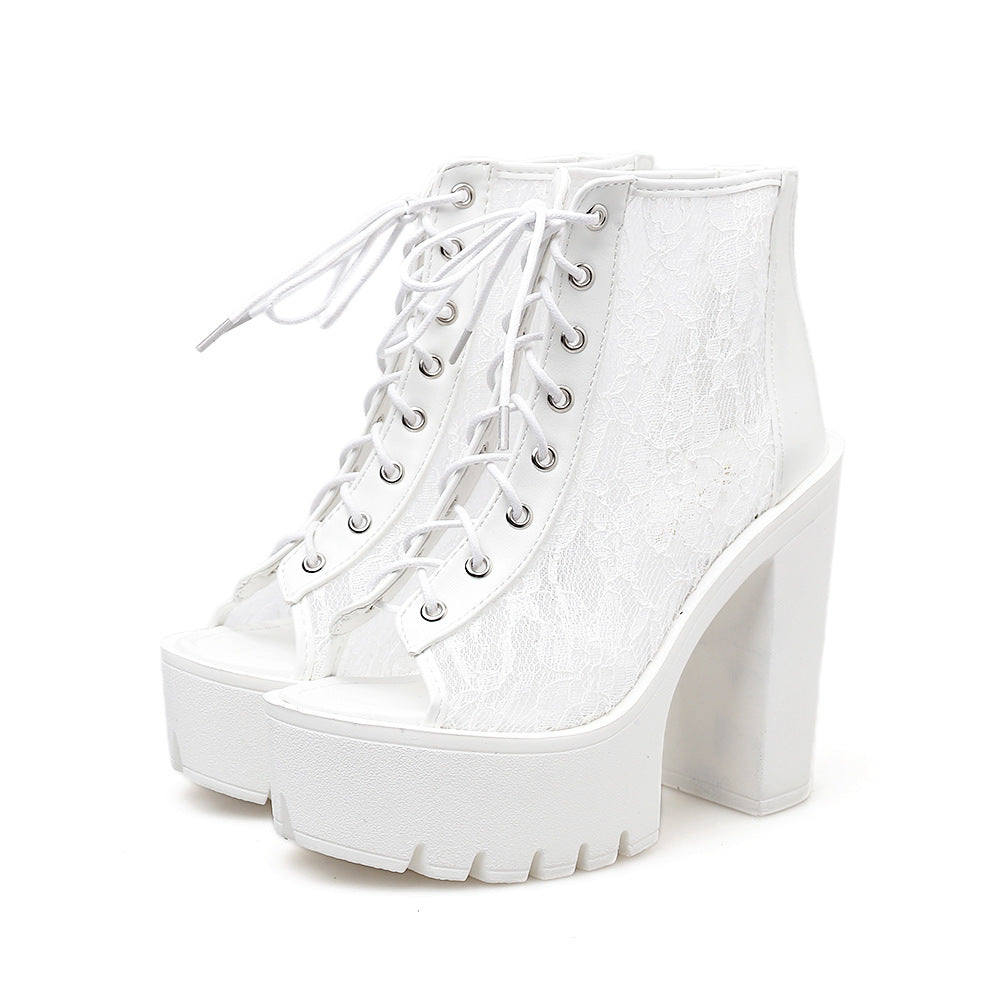 Gothic white platform sandals with lace, high square heels perfect for alternative rock style outfits.
