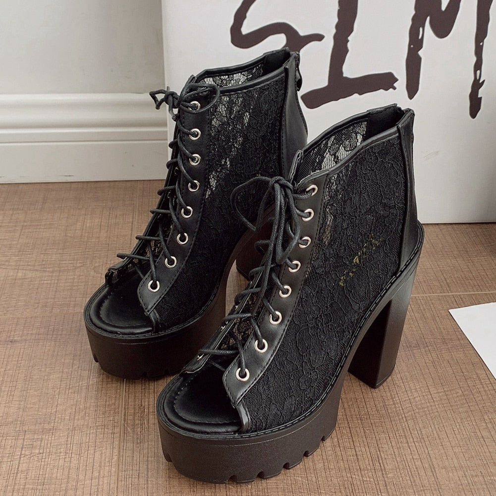 Gothic black lace peep-toe high heel sandals with thick platform and lace-up design, perfect for alternative fashion.