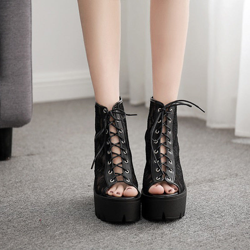 Gothic black and white platform sandals for women with thick square heels and lace-up design, perfect for alternative rock style.