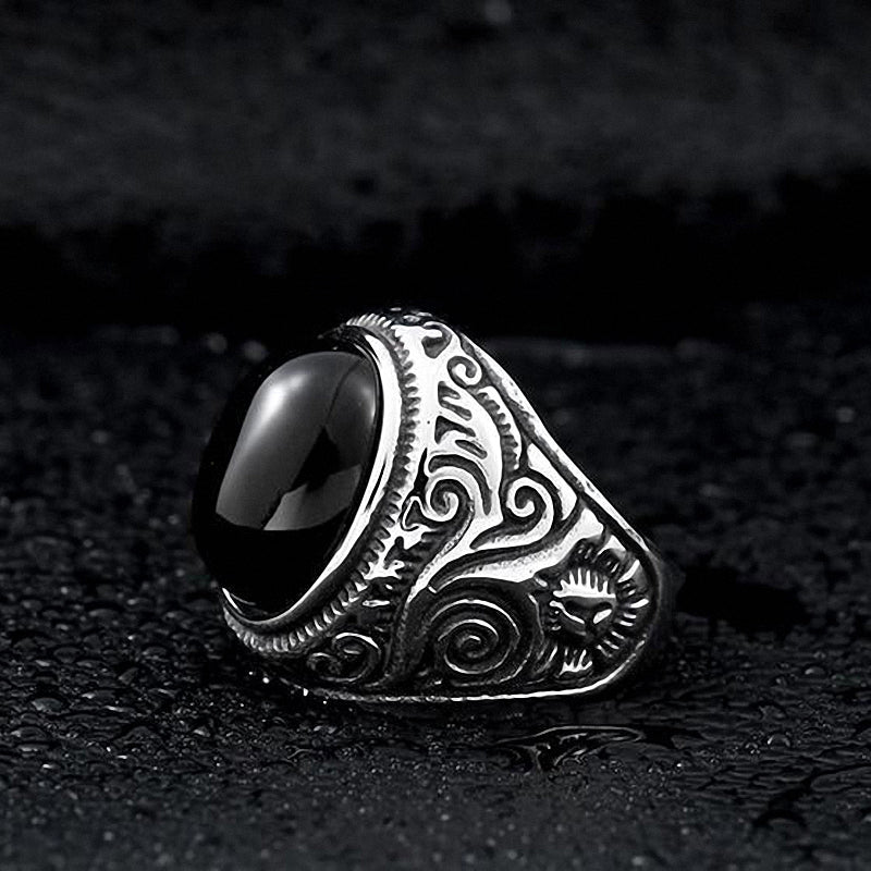 Gothic blue and black stone ring in stainless steel, showcasing intricate design and a large black stone centerpiece.