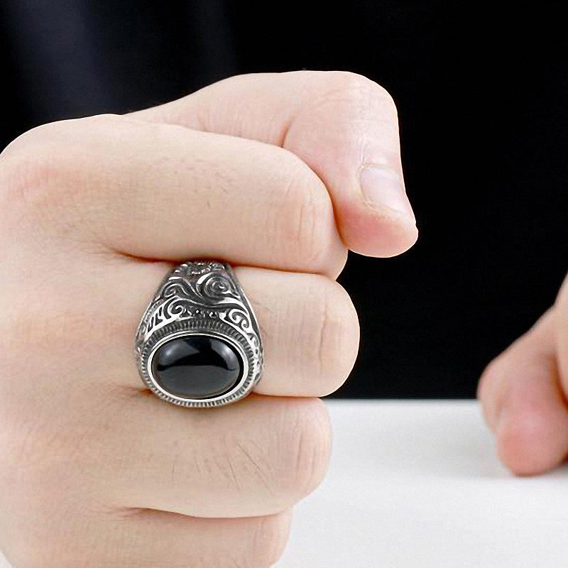 Gothic blue and black stone ring on hand, showcasing stainless steel design and intricate details, perfect for any style.