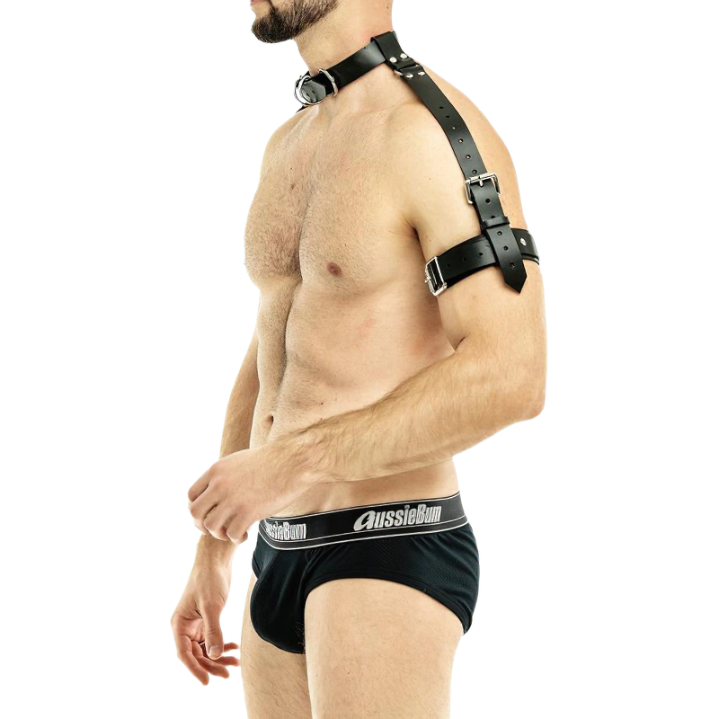 Men's faux leather body harness belt in punk style, showcasing sleek design and silver fittings for a daring look.