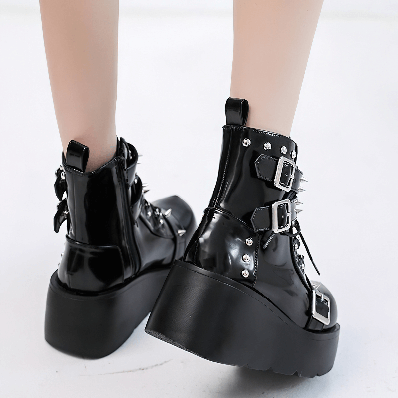 Gothic platform ankle boots for women featuring spikes and rivets, perfect for punk fashion lovers.