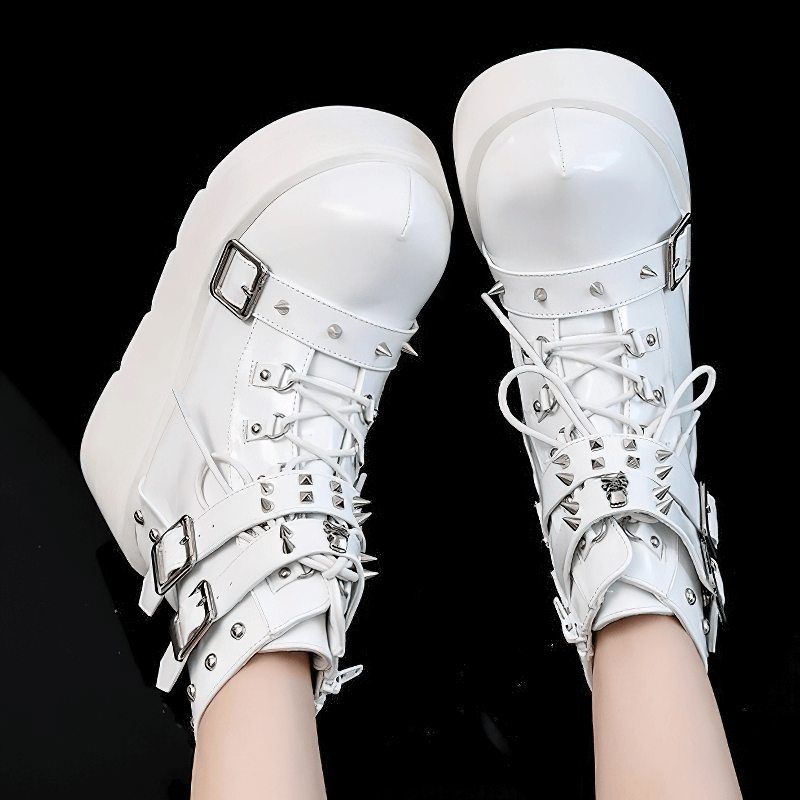 White Gothic Buckles Platform Ankle Boots with spikes and rivets for women, showcasing a punk style.