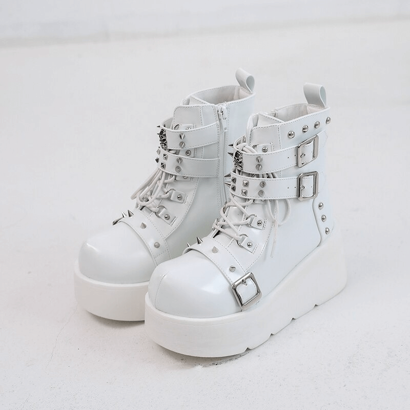 Gothic white platform ankle boots with rivets and buckles for women's punk style fashion.