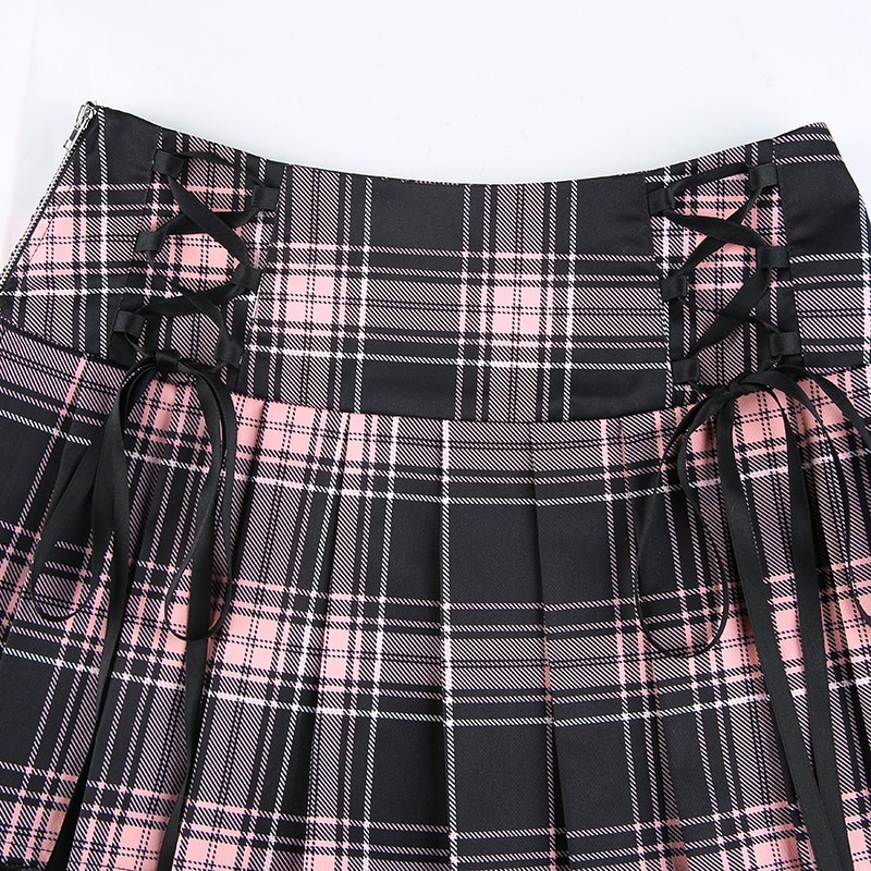 Gothic checkered mini skirt in black and pink plaid with lace and side ties for a trendy punk aesthetic.