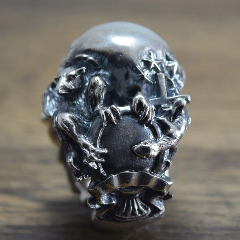 Gothic stainless steel ring featuring intricate skeleton design with a skull, perfect for edgy outfits.