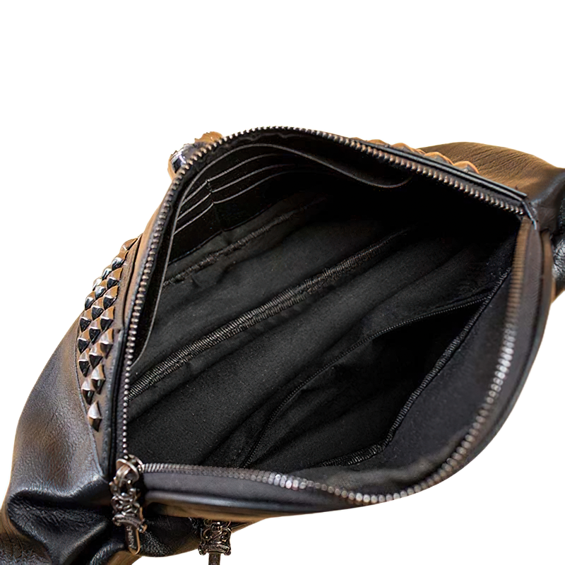 Inside view of the Gothic crossbody bag showing multiple compartments and sleek black lining for stylish organization.