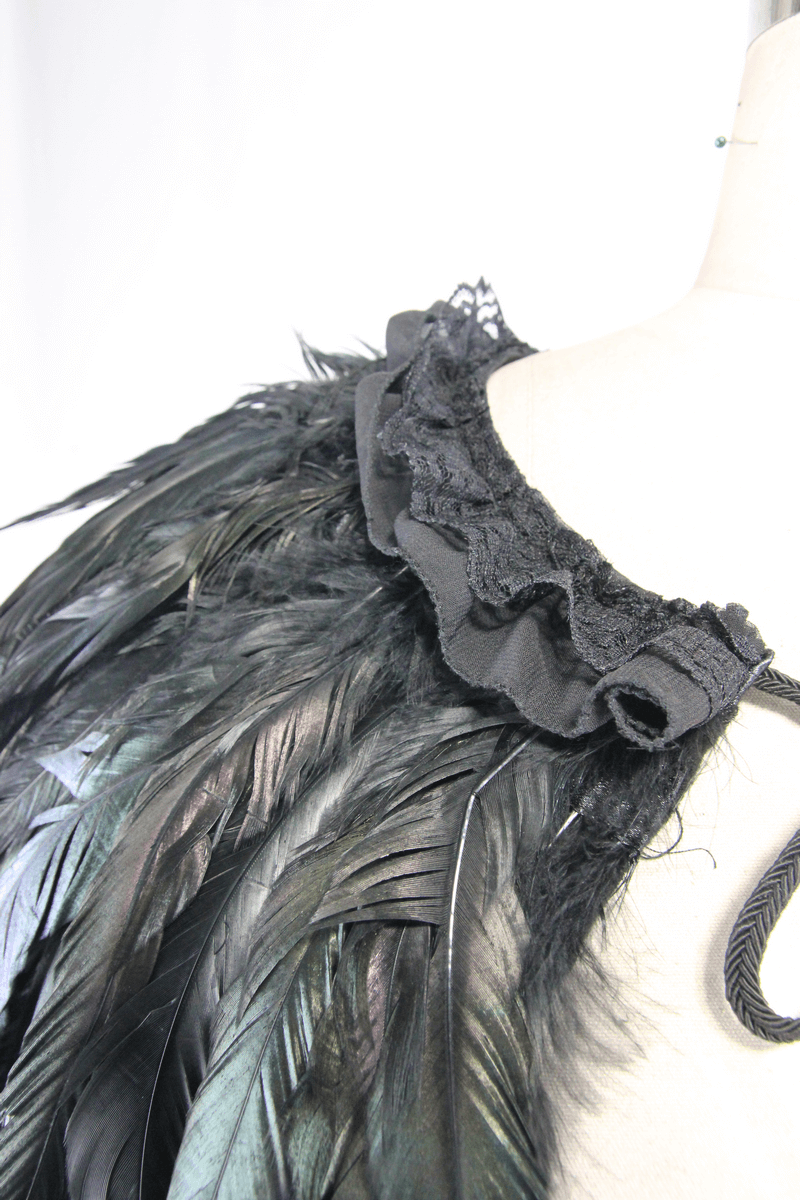Close-up of the gothic crow feather shoulder accessory featuring a ruffled neckline, perfect for steampunk style.