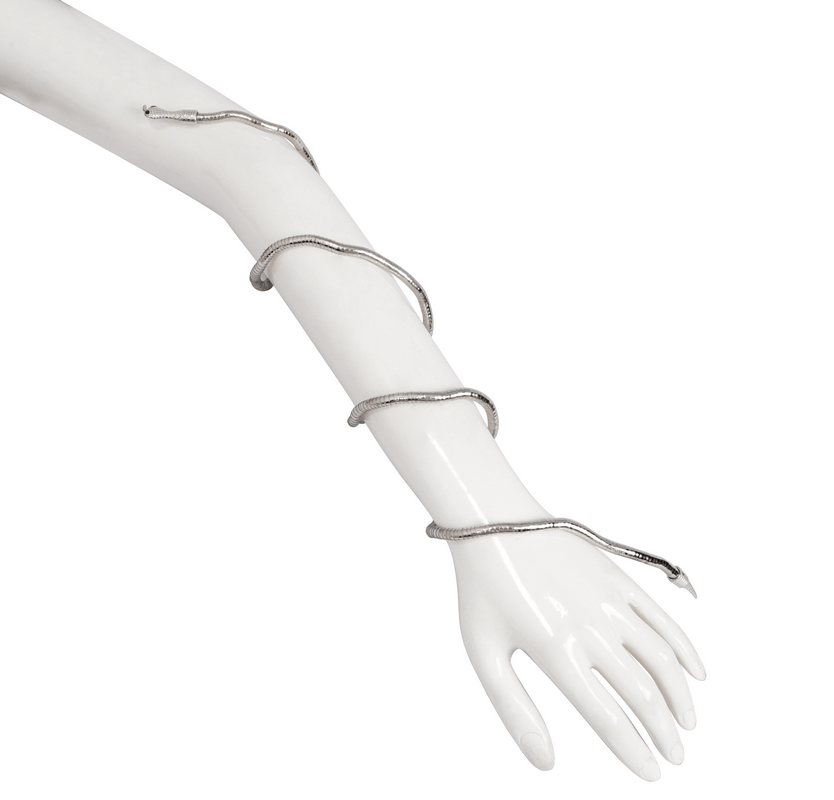 Gothic curved snake bracelet displayed on a mannequin's arm, showcasing vintage style and adjustable design.