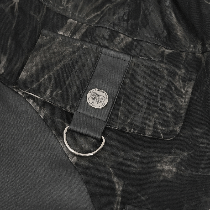 Close-up of gothic jogger pants pocket with rivet detail and metal ring for trendy punk style.