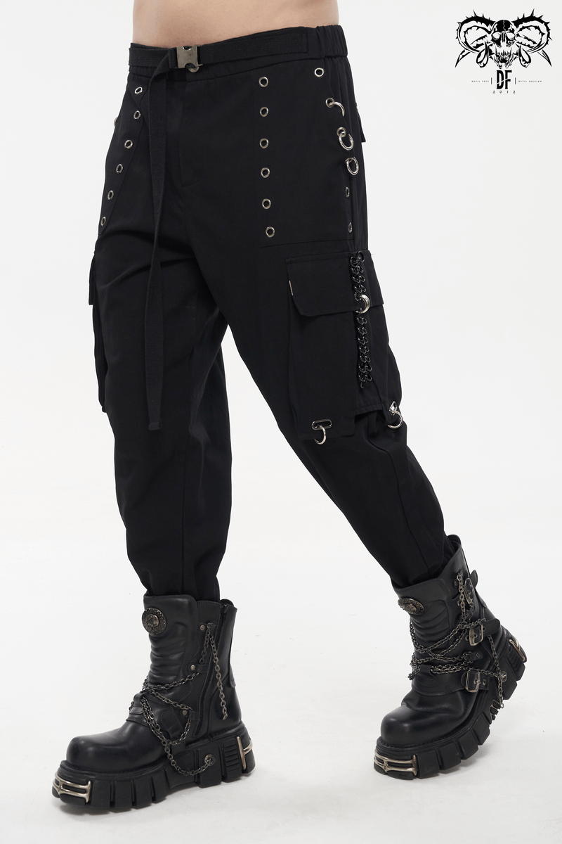 Men's gothic tapered cargo pants with rivets, hoop accents, and edgy black combat boots.
