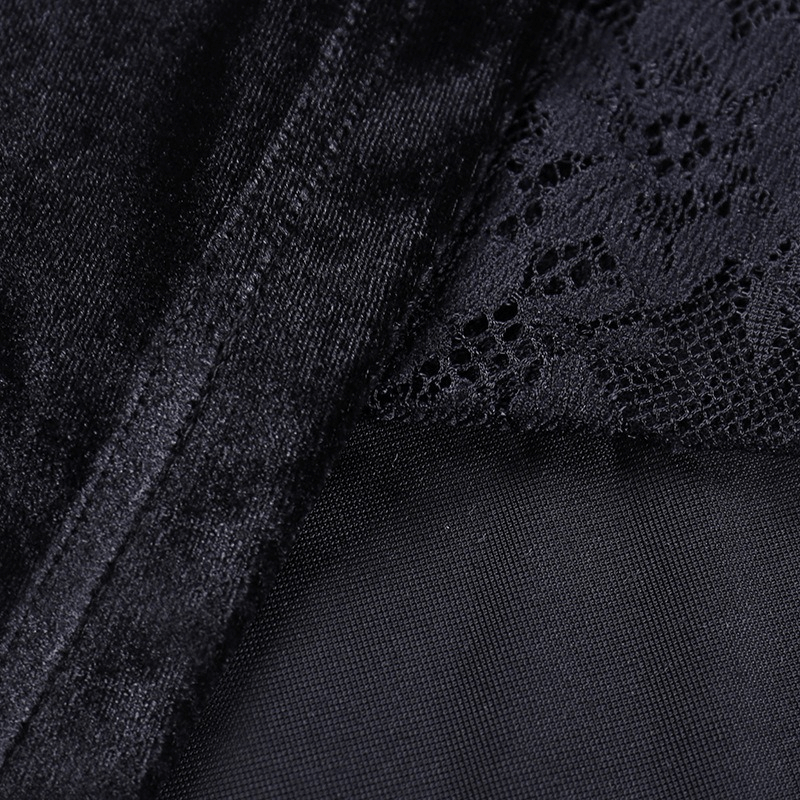Close-up of elegant black velvet fabric with lace detailing for a gothic mermaid women's dress.