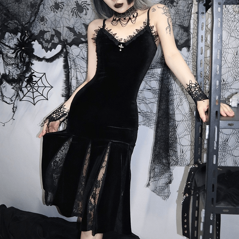 Elegant women's black velvet midi dress with lace details, perfect for gothic and grunge styles.