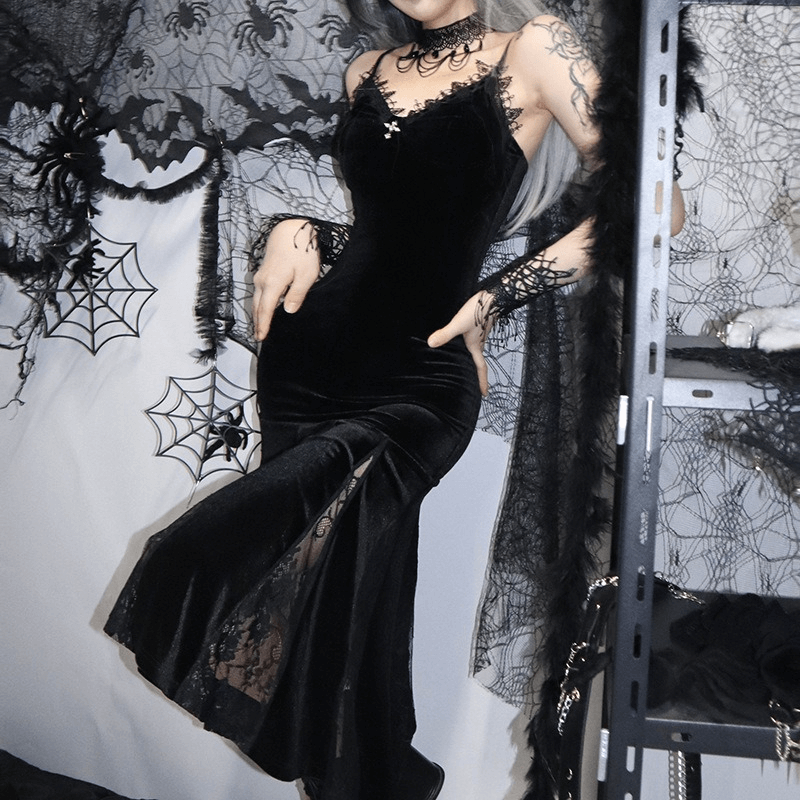 Elegant black velvet midi dress with lace details, perfect for a gothic or grunge style.