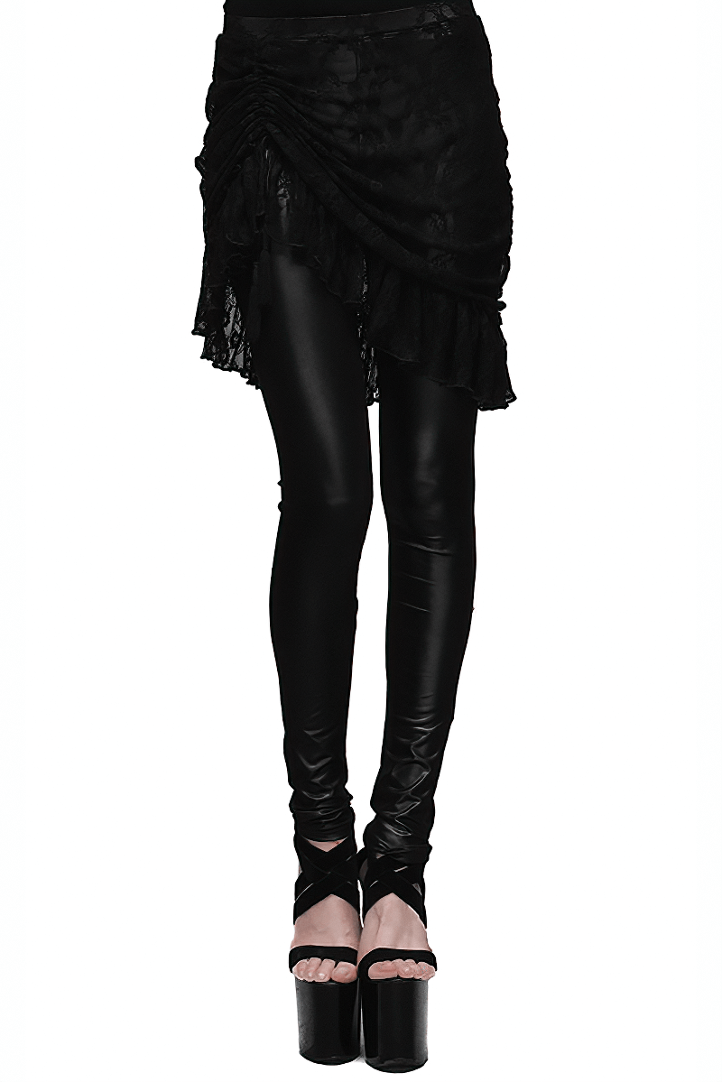 Stylish women's black faux leather leggings with adjustable lace skirt, perfect for a gothic look.