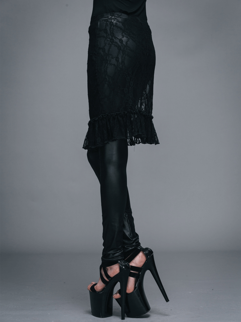 Stylish woman in gothic faux leather leggings with a lace adjustable skirt and high heels.