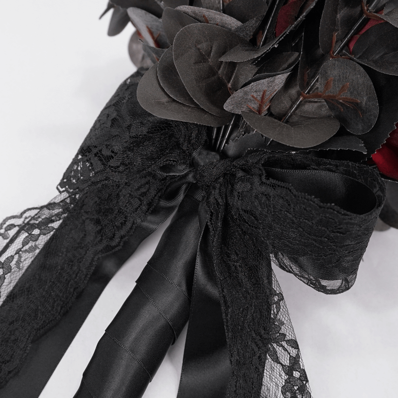 Gothic black and red flower bouquet with lace accents, a stylish accessory for women.