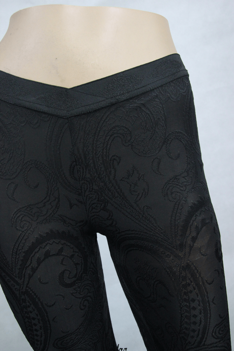 Black patterned leggings with a stylish high waistband, perfect for a trendy gothic look.