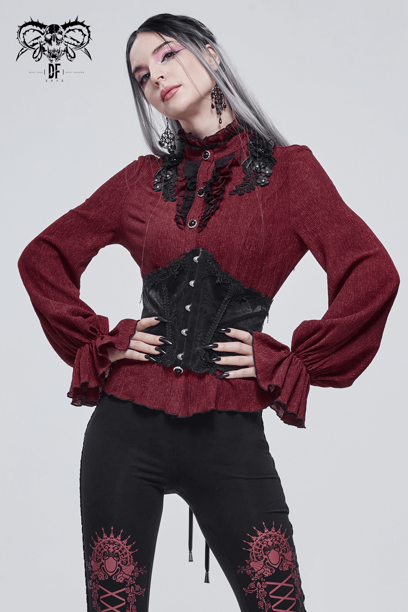 Gothic woman in red blouse and black floral lace corset, showcasing a stylish gothic outfit with elegant details.