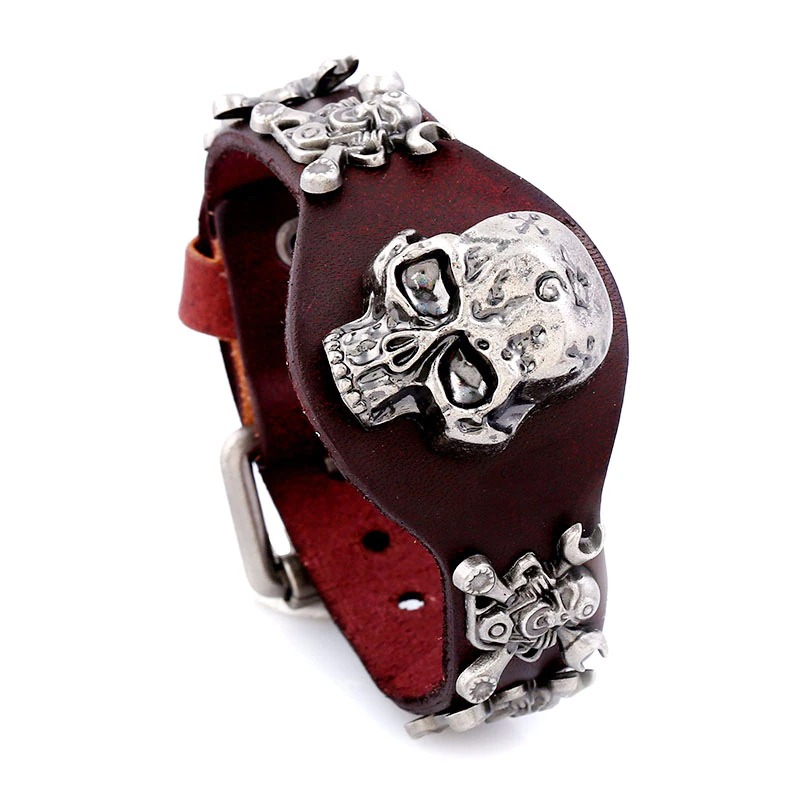 Gothic genuine leather bracelet for unisex with silver skull details, perfect for edgy fashion statements.