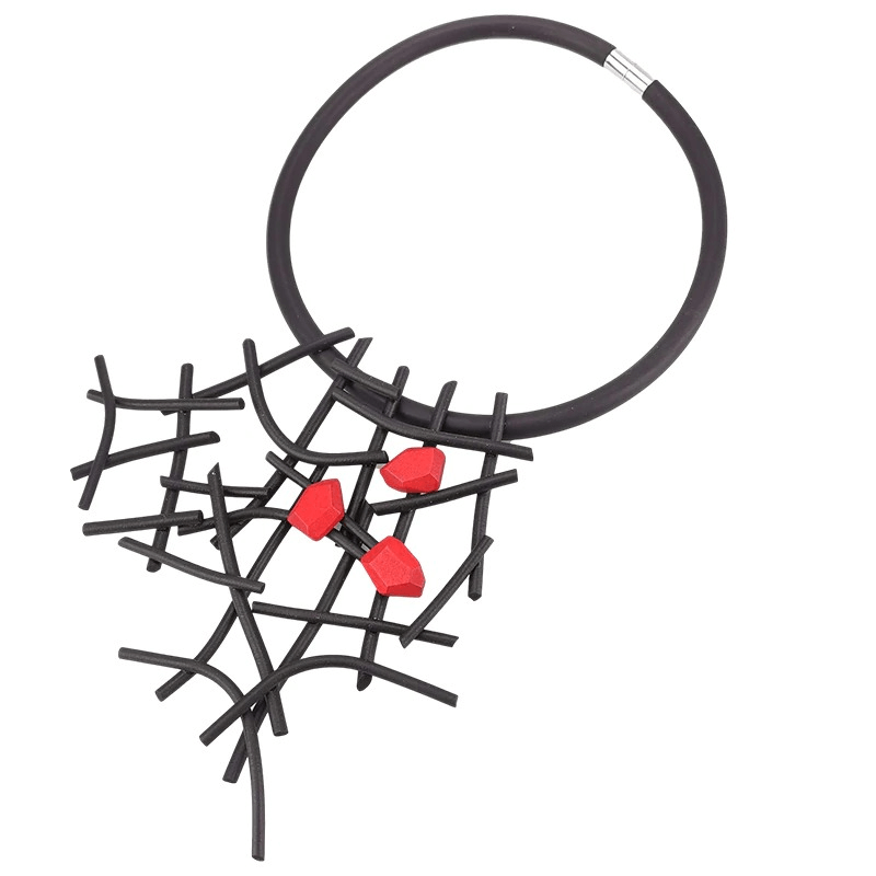 Gothic handmade rubber and wooden necklace with striking red accents for a unique fashion statement.