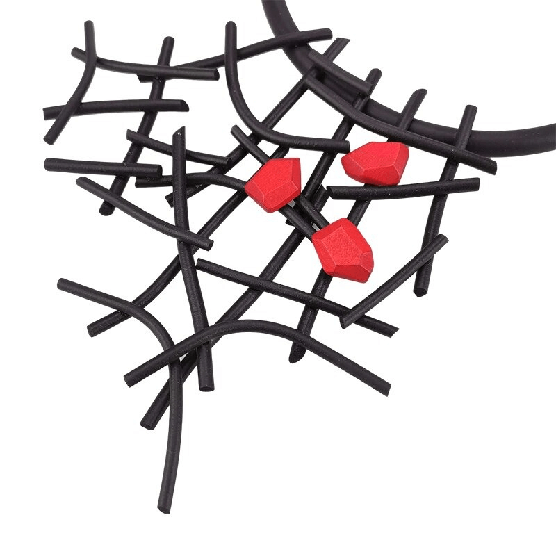 Gothic handmade rubber wooden necklace featuring unique black and red design, perfect for stylish women.
