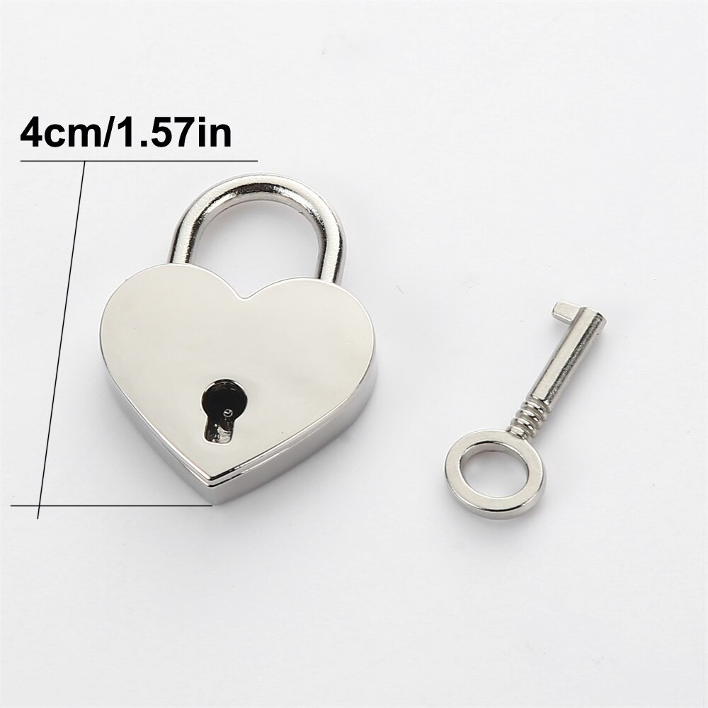 Heart-shaped silver padlock with key, measuring 4cm, perfect for love-themed gifts and decorations.