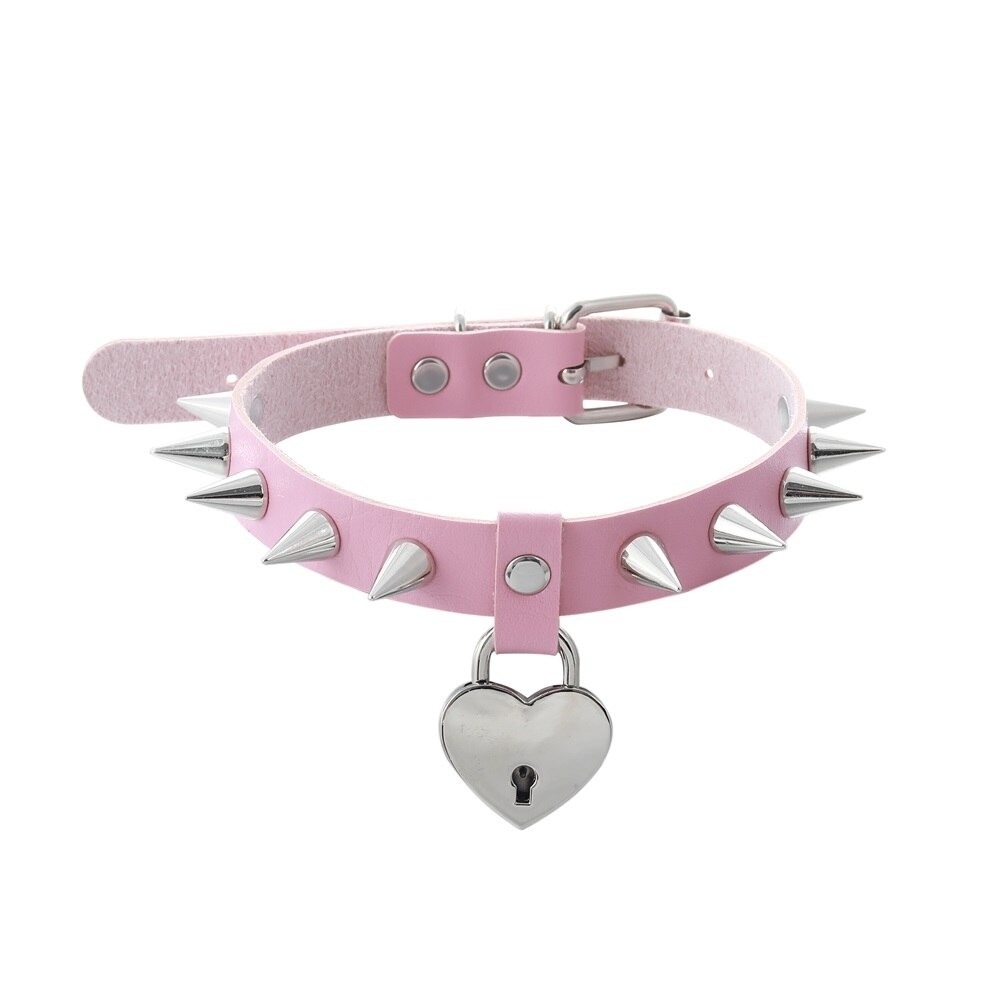 Gothic heart choker in pink PU leather with silver spikes and heart-shaped lock pendant.
